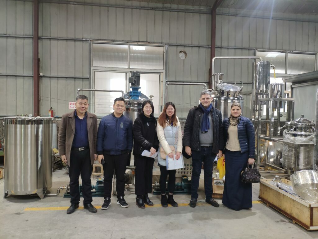 Visit the peanut processing machine factory with customers